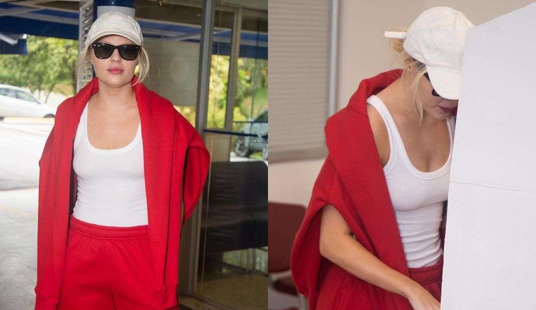 Luísa Sonza é fotografada por paparazzi indo votar usando vermelho da cabeça aos pés