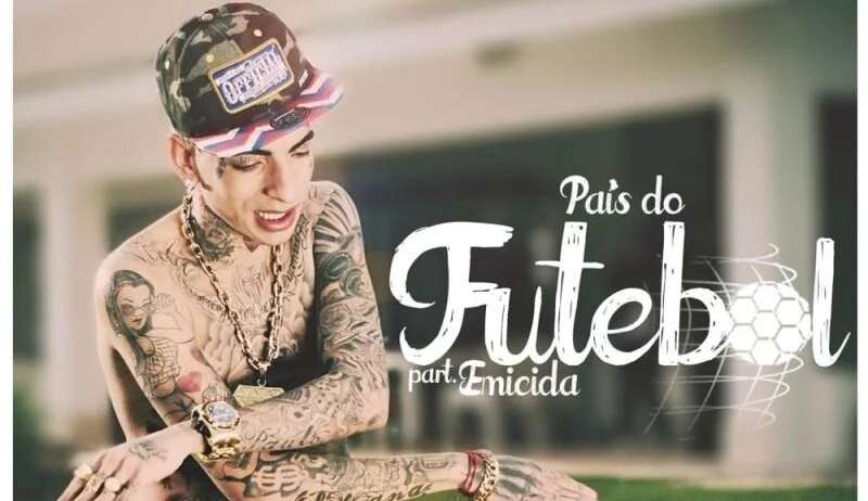 “País do Futebol”: MC Guimê e Emicida voltam às paradas musicais superando hinos oficiais da Copa do Mundo