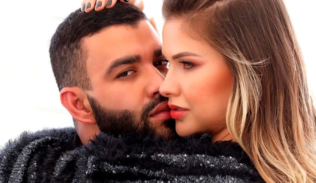 Gusttavo Lima aparece segurando a mão de uma mulher e fãs especulam ser Andressa Suita