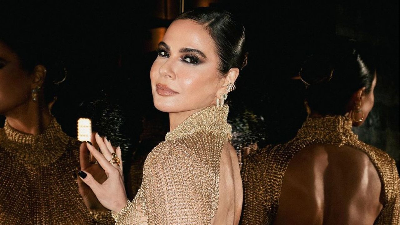Luciana Gimenez chama atenção com costas nuas no leilão de Neymar