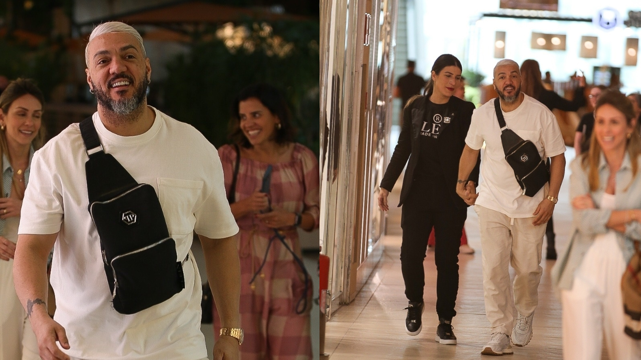 Belo é flagrado passeando com mulher misteriosa em shopping