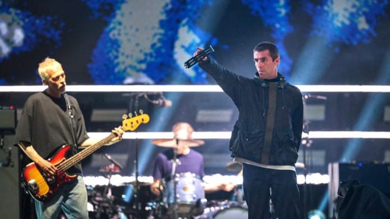 Oasis e sua banda | reprodução/Gareth Cattermole/Getty Images Embed