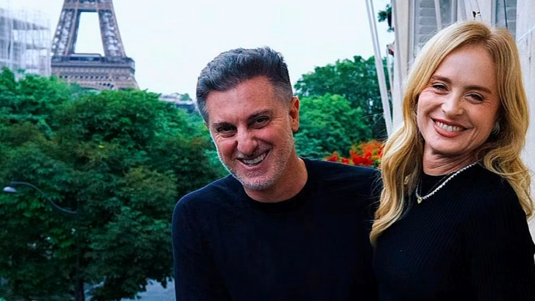 Angélica e Luciano Huck trocam beijo em Paris durante passeio com filho e nora