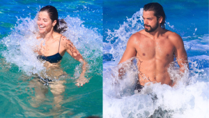 Agatha Moreira e Rodrigo Simas aproveitam praia da Barra da Tijuca em dia ensolarado