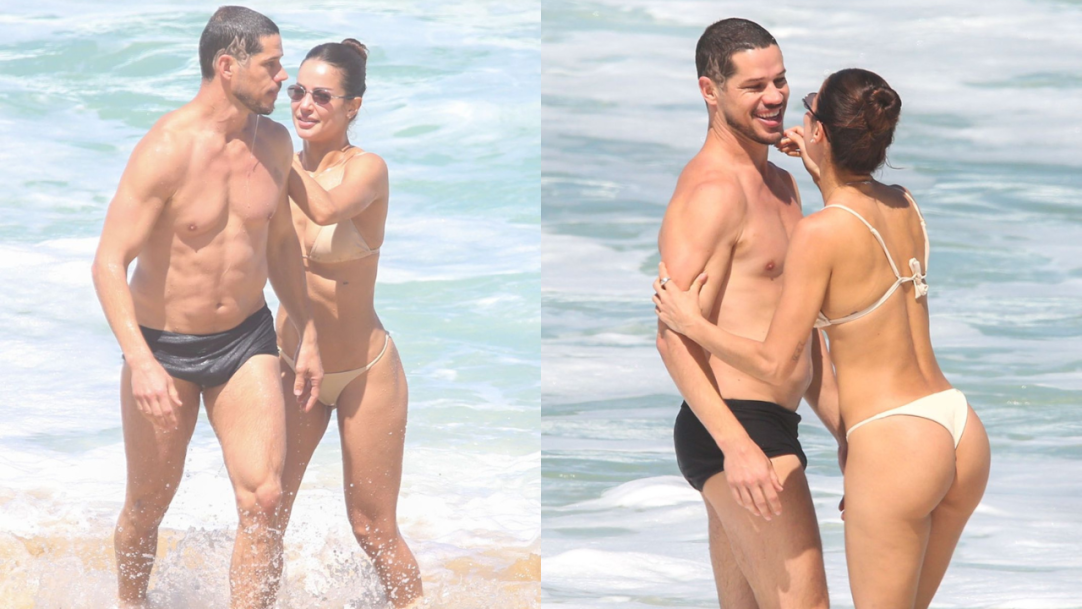 Nanda Marques e José Loreto trocam chamegos e brincam no mar durante dia de praia no Rio